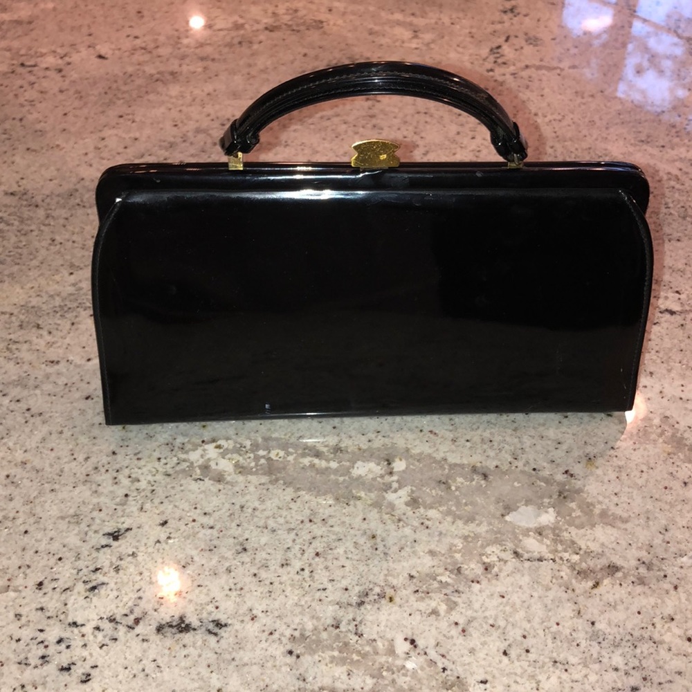 Theodor Vintage black purse with brass clasp